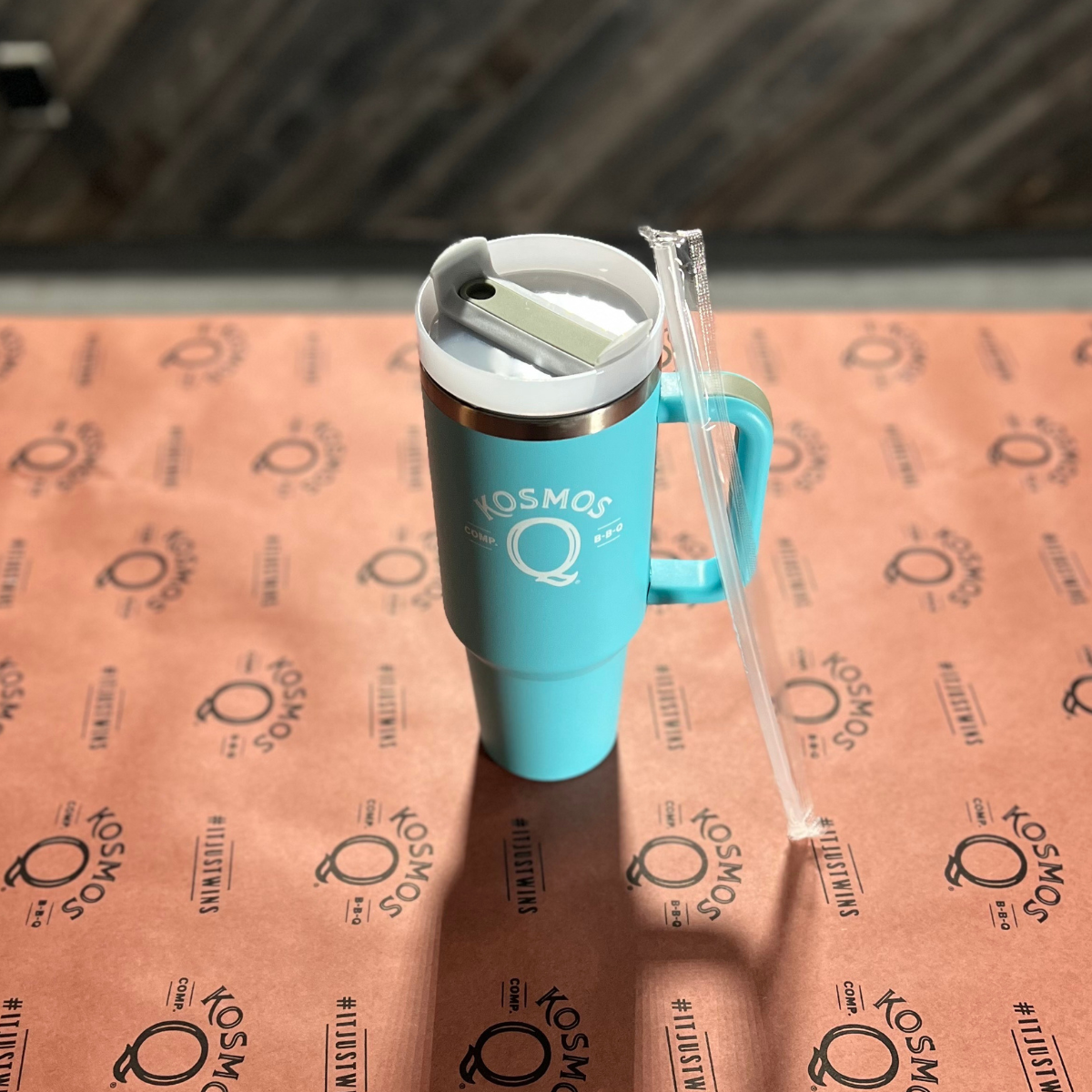 https://kosmosq.com/cdn/shop/files/kosmo-s-q-kosmos-q-merchandise-kosmos-q-40-oz-teal-tumbler-36644980097183_1200x.png?v=1700592223