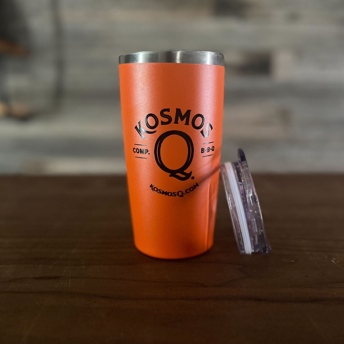 https://kosmosq.com/cdn/shop/files/kosmo-s-q-kosmos-q-merchandise-kosmos-q-tumbler-limited-edition-orange-36425144664223_1200x.png?v=1689003475
